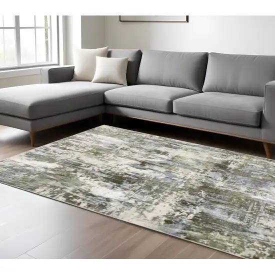 Green Blue Grey Ivory And Brown Abstract Power Loom Stain Resistant Area Rug Photo 1