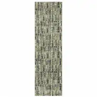 Photo of Green Blue Ivory Beige And Light Blue Abstract Power Loom Stain Resistant Runner Rug