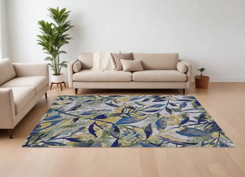 Green Blue and Ivory Floral Power Loom Worn Faded Area Rug Photo 1