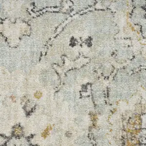 Photo of Green Floral Distressed Area Rug