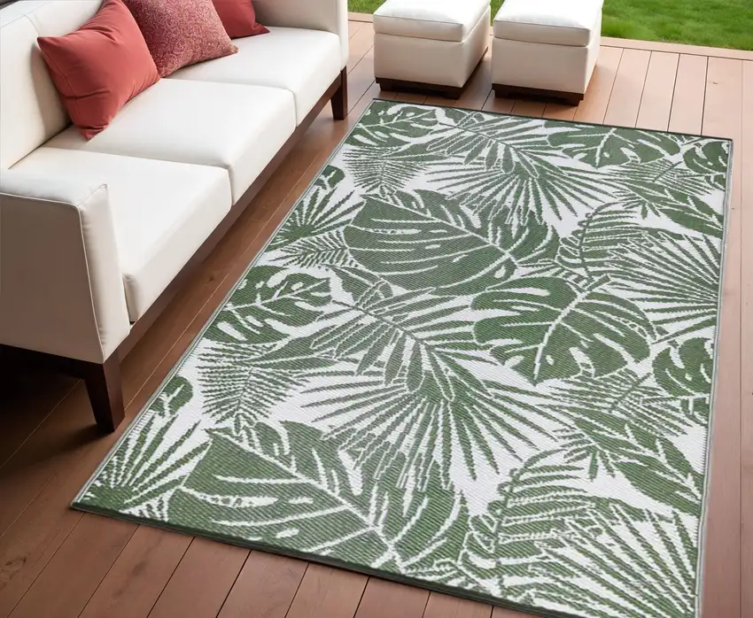 Green Floral Machine Braided Distressed Area Rug With UV Protection Photo 1