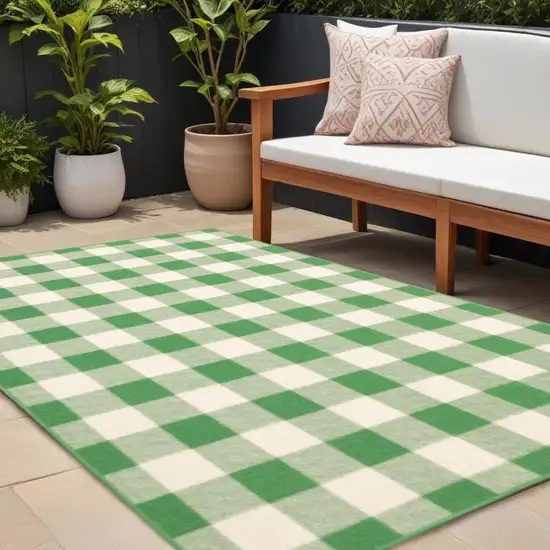Green and Ivory Geometric Stain Resistant Indoor Outdoor Area Rug Photo 1