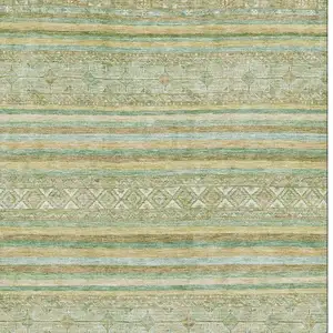 Photo of Green Gold And Beige Striped Washable Area Rug With UV Protection