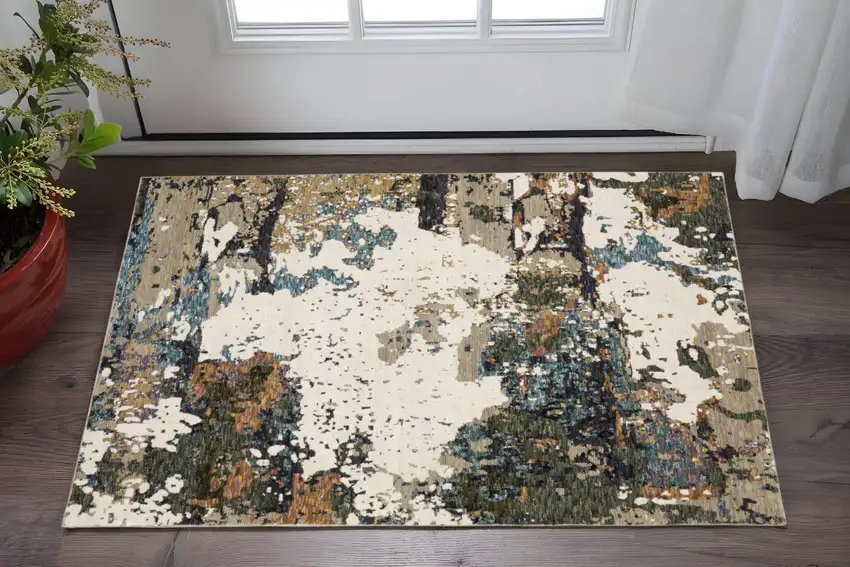 Blue and Ivory Abstract Power Loom Area Rug Photo 1