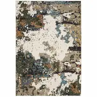 Photo of Green Gold And Blue Abstract Power Loom Stain Resistant Area Rug