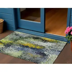 Photo of Green Gold And Charcoal Abstract Washable Indoor Outdoor Area Rug