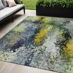 Photo of Green Gold And Charcoal Abstract Washable Indoor Outdoor Area Rug
