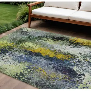 Photo of Green Gold And Charcoal Abstract Washable Indoor Outdoor Area Rug