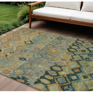 Photo of Green Gold And Copper Geometric Washable Indoor Outdoor Area Rug