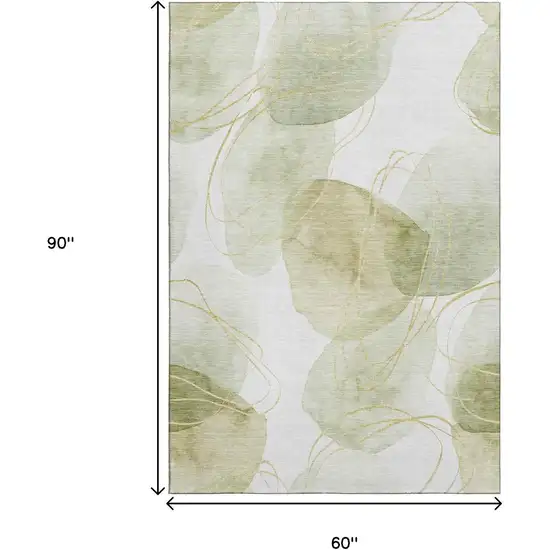 Green Gold And Ivory Abstract Washable Area Rug With UV Protection Photo 9