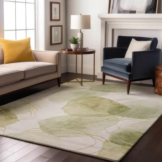 Green Gold And Ivory Abstract Washable Area Rug With UV Protection Photo 4