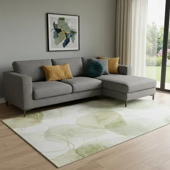 Green Gold And Ivory Abstract Washable Area Rug With UV Protection Photo 1