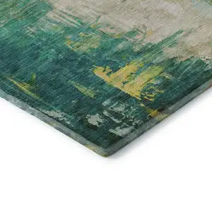 Photo of Green Gold And Orange Abstract Washable Area Rug With UV Protection