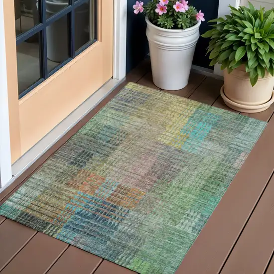 Green Gold And Teal Blue Abstract Washable Indoor Outdoor Area Rug Photo 1
