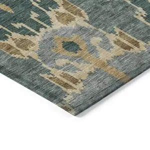 Photo of Green Gray And Gold Ikat Washable Indoor Outdoor Area Rug