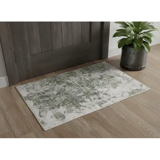Green Gray And Ivory Abstract Distressed Stain Resistant Area Rug Photo 1