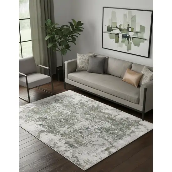 Green Gray And Ivory Abstract Distressed Stain Resistant Area Rug Photo 1