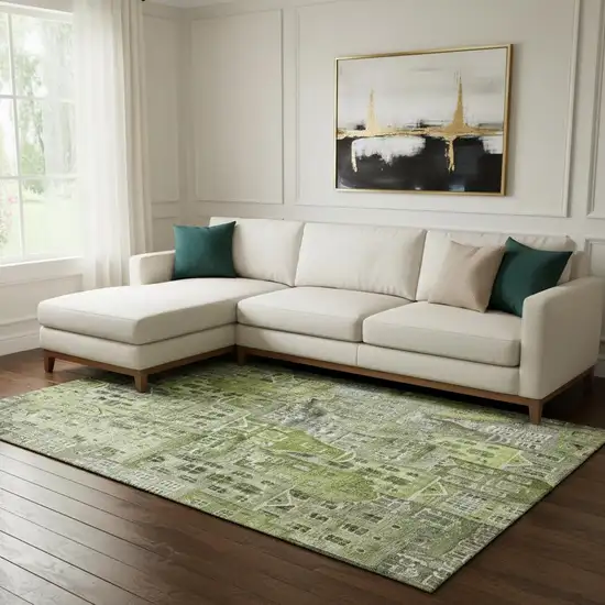 Green Gray And Ivory Abstract Geometric Washable Area Rug With UV Protection Photo 1