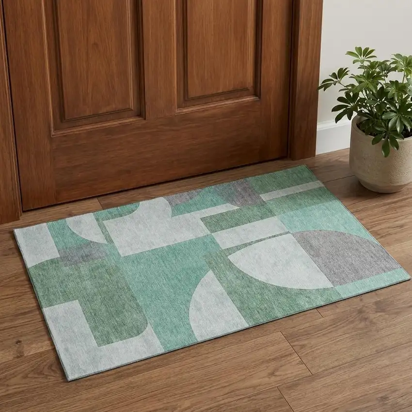 Green Gray And Ivory Abstract Geometric Washable Area Rug With UV Protection Photo 1