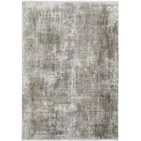Photo of Green Gray And Ivory Abstract Power Loom Distressed Area Rug With Fringe