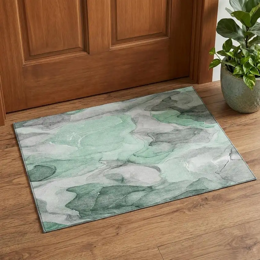 Green Gray And Ivory Abstract Washable Area Rug With UV Protection Photo 1