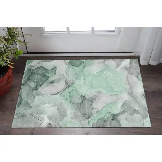 Green Gray And Ivory Abstract Washable Area Rug With UV Protection Photo 2