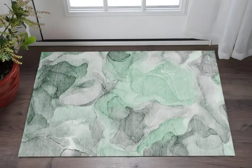 Green Gray And Ivory Abstract Washable Area Rug With UV Protection Photo 2