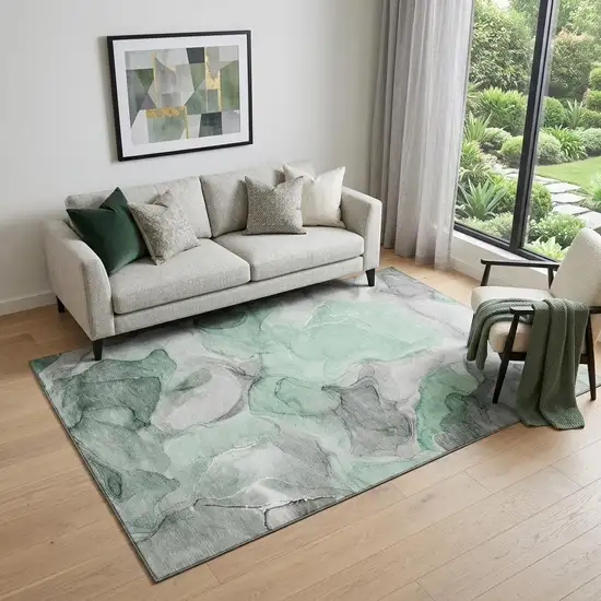 Green Gray And Ivory Abstract Washable Area Rug With UV Protection Photo 1