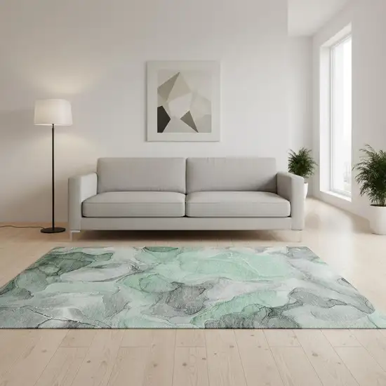 Green Gray And Ivory Abstract Washable Area Rug With UV Protection Photo 1