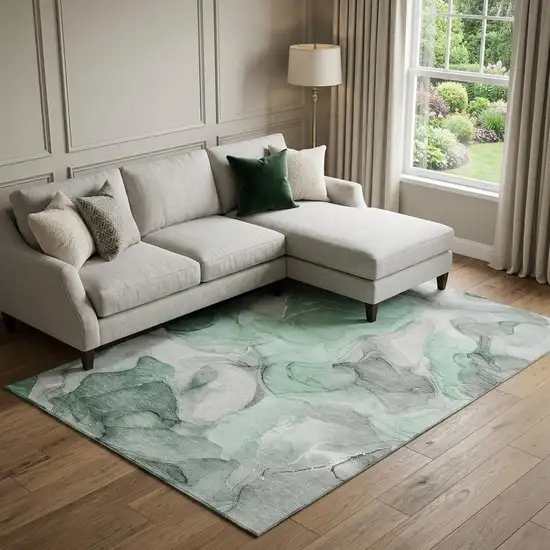 Green Gray And Ivory Abstract Washable Area Rug With UV Protection Photo 1