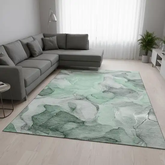 Green Gray And Ivory Abstract Washable Area Rug With UV Protection Photo 1