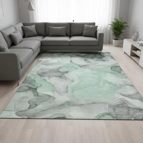 Green Gray And Ivory Abstract Washable Area Rug With UV Protection Photo 1