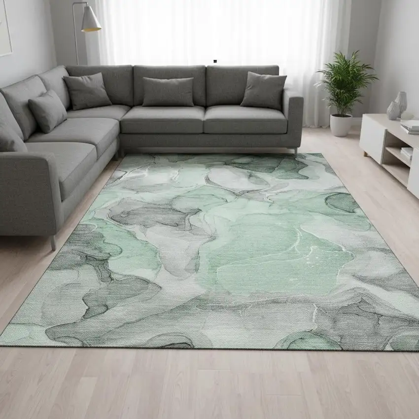 Green Gray And Ivory Abstract Washable Area Rug With UV Protection Photo 1