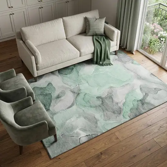 Green Gray And Ivory Abstract Washable Area Rug With UV Protection Photo 1