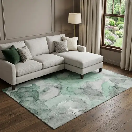 Green Gray And Ivory Abstract Washable Area Rug With UV Protection Photo 1