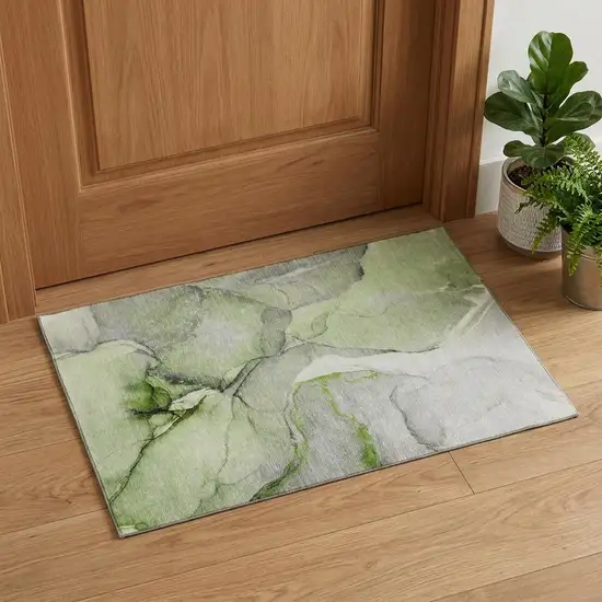 Green Gray And Ivory Abstract Washable Area Rug With UV Protection Photo 1