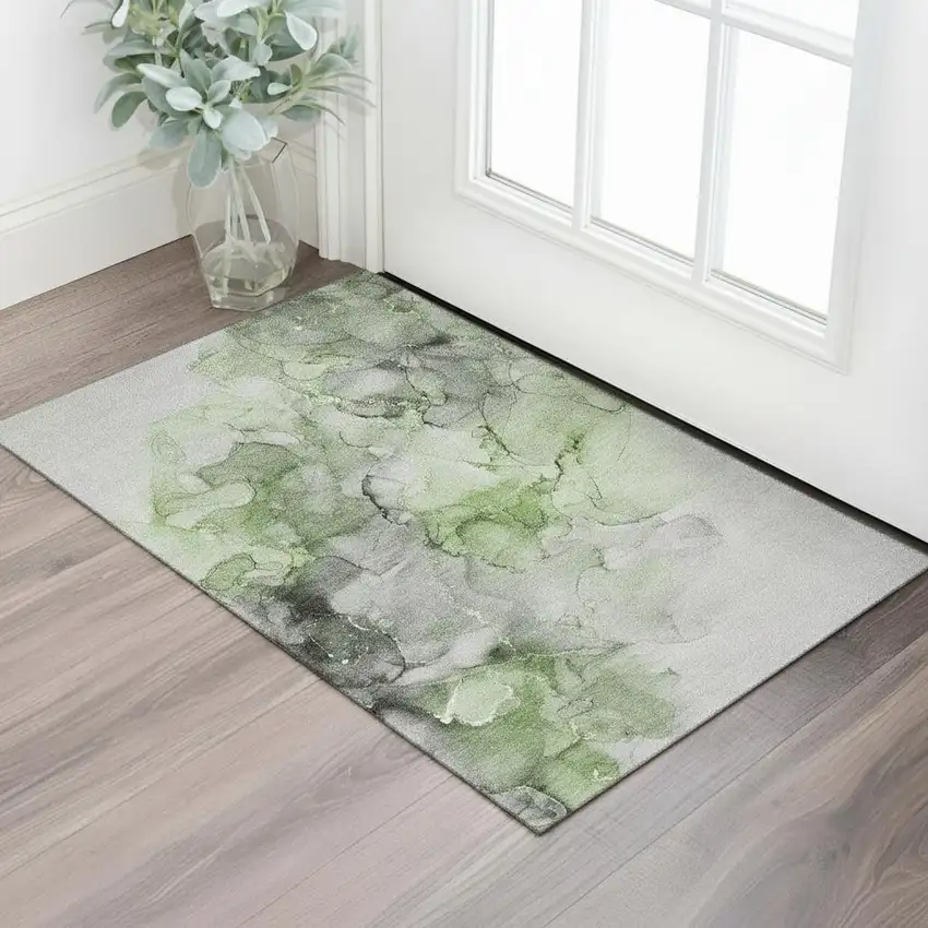 Green Gray And Ivory Abstract Washable Area Rug With UV Protection Photo 1
