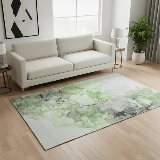 Green Gray And Ivory Abstract Washable Area Rug With UV Protection Photo 1