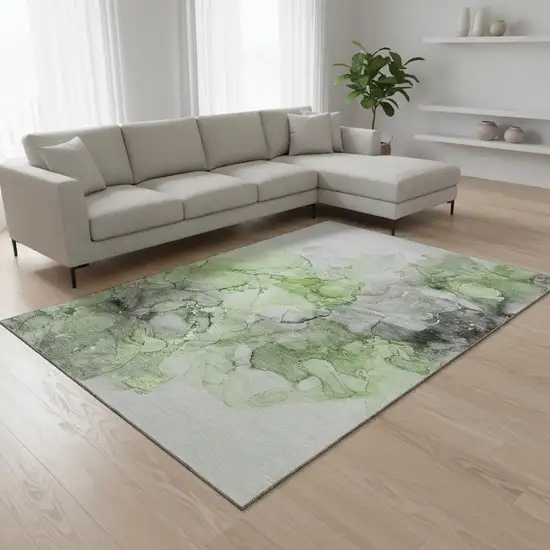 Green Gray And Ivory Abstract Washable Area Rug With UV Protection Photo 1