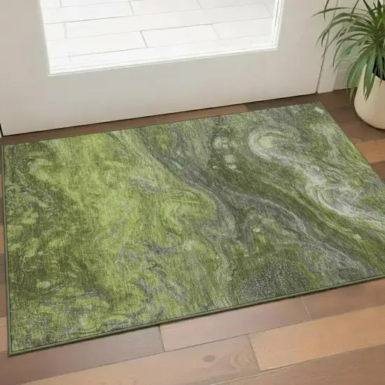 Green Gray And Ivory Abstract Washable Area Rug With UV Protection Photo 1
