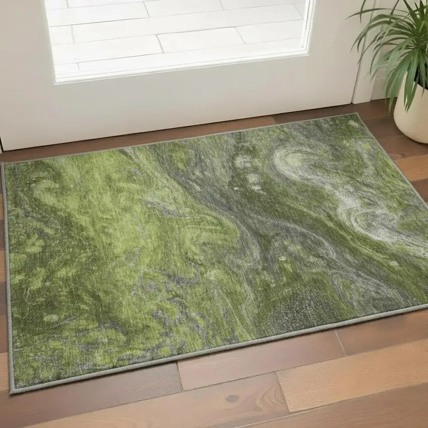 Green Gray And Ivory Abstract Washable Area Rug With UV Protection Photo 1