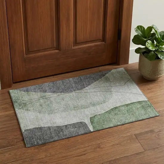 Green Gray And Ivory Abstract Washable Area Rug With UV Protection Photo 1