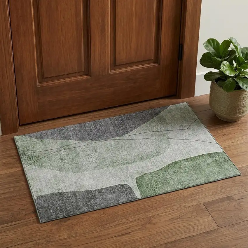 Green Gray And Ivory Abstract Washable Area Rug With UV Protection Photo 1