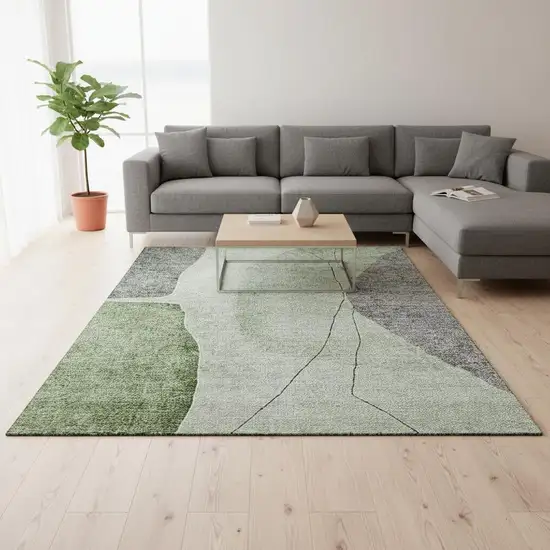 Green Gray And Ivory Abstract Washable Area Rug With UV Protection Photo 1