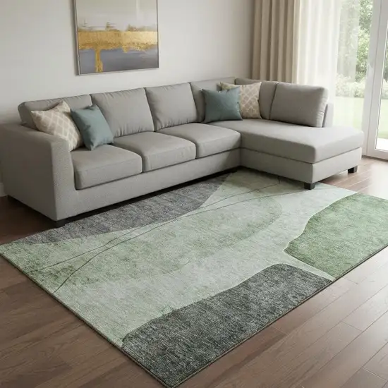 Green Gray And Ivory Abstract Washable Area Rug With UV Protection Photo 1