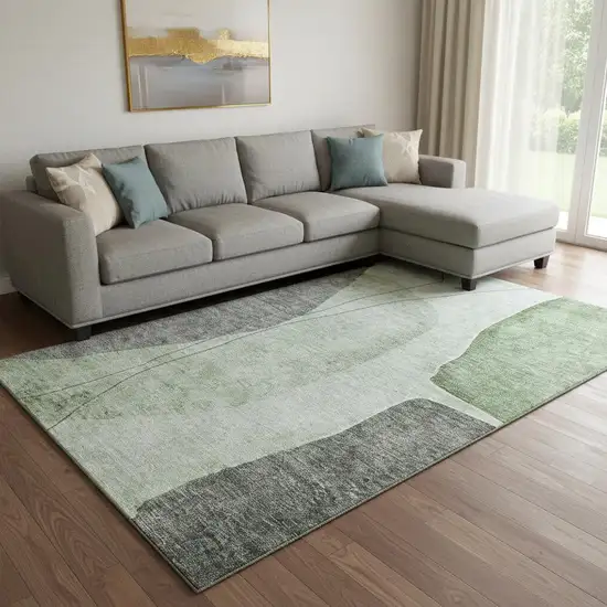 Green Gray And Ivory Abstract Washable Area Rug With UV Protection Photo 1