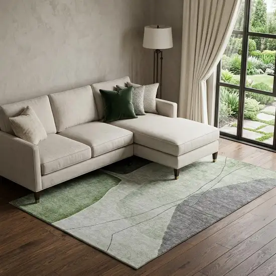Green Gray And Ivory Abstract Washable Area Rug With UV Protection Photo 1