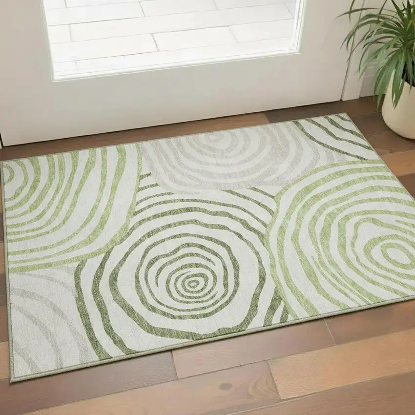 Green Gray And Ivory Abstract Washable Area Rug With UV Protection Photo 1