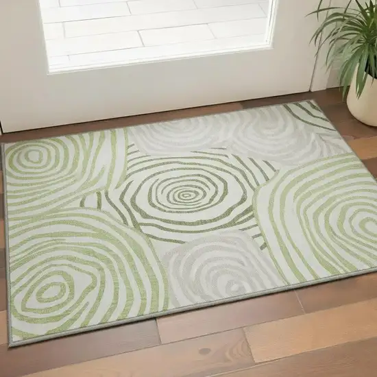 Green Gray And Ivory Abstract Washable Area Rug With UV Protection Photo 2