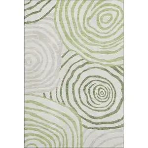 Photo of Green Gray And Ivory Abstract Washable Area Rug With UV Protection